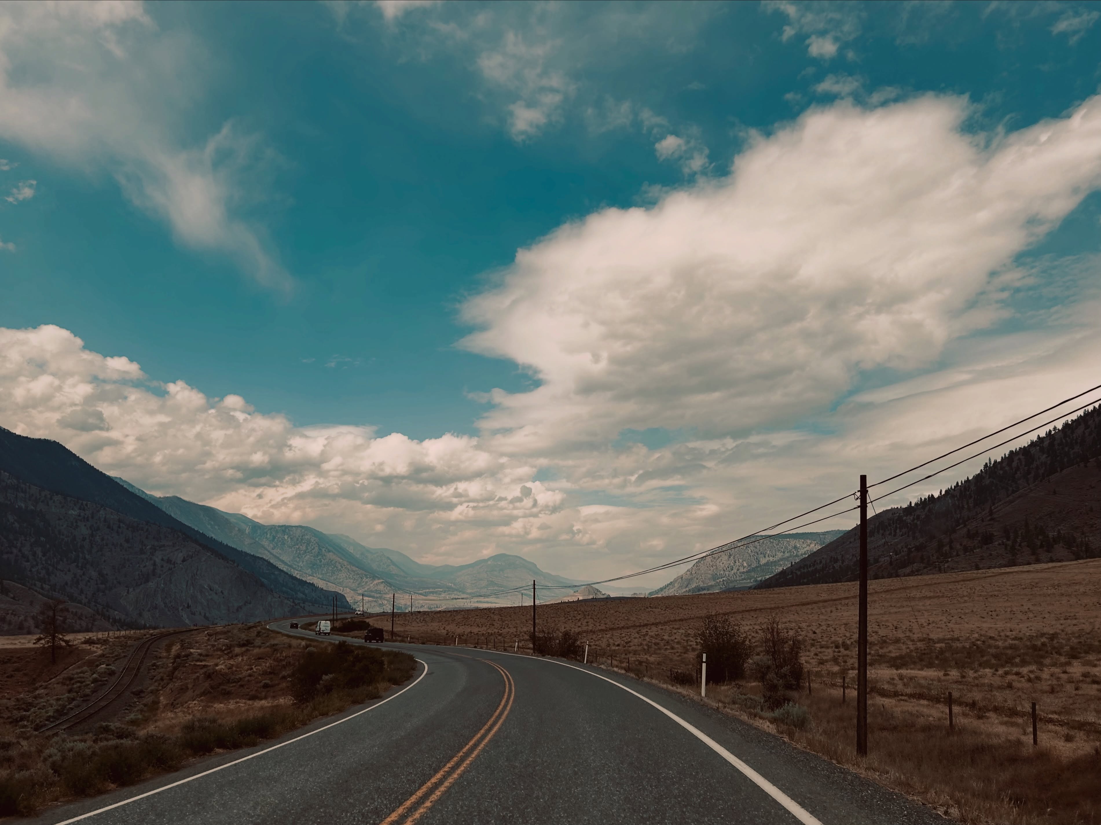 The road unfolds ahead, leaving the path behind